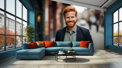 Smiling portrait of a ginger casual businessman in city Wall mural