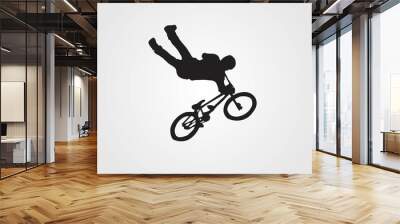 Cyclist rider bmx performs trick jump logo silhouette vector Wall mural