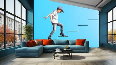 growth business concept. young businessman climbing the career ladder Wall mural