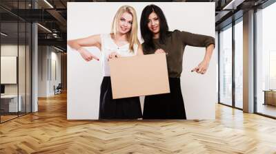 two women with blank board Wall mural