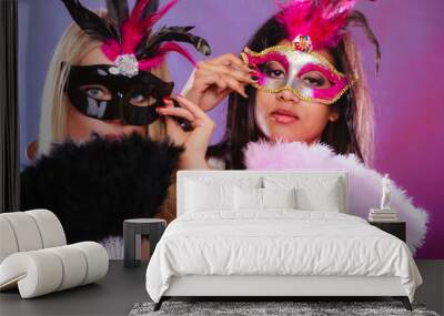 Two women with carnival venetian masks Wall mural