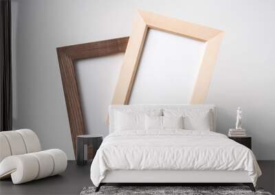 top view of two brown wood photo frame on white Wall mural