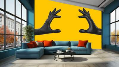 Empty holding food like a burger black two hand gesture concept. hand measuring isolated on yellow. 3d rendering. Wall mural