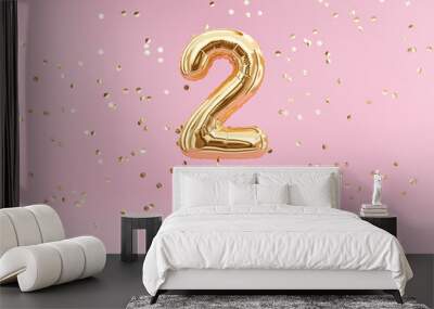 Two year birthday. Number 2 flying foil balloon and confetti. Two-year anniversary background. Wall mural