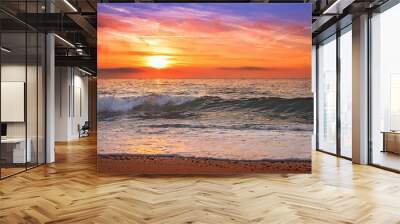 Colorful ocean beach sunrise with deep blue sky. Wall mural