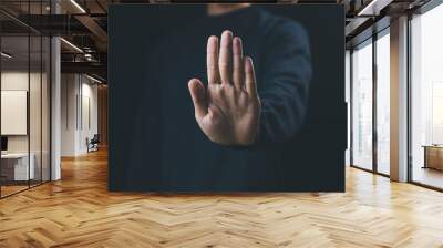 person's hand showing palm gestures stop concepts of violence, warning, refuse, and defense. the hand sign of men a stop, caution  Wall mural