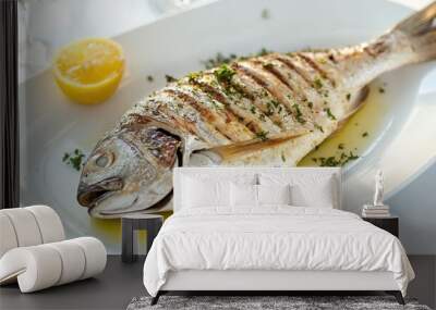 Fresh striped sea bream rests on a clean white plate Wall mural