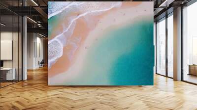 Beach with turquoise sea water. Top view of beautiful white sand. Wall mural