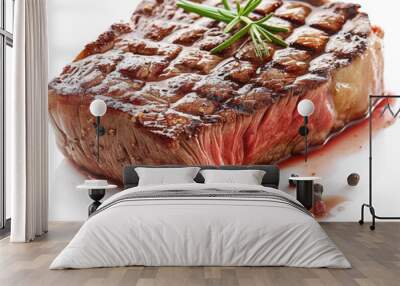 Closeup of a perfectly cooked steak with rosemary and peppercorns. Wall mural