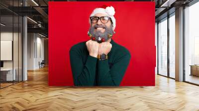 Photo of cheerful man with decorated beard waiting for Christmas Wall mural