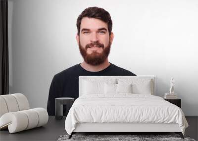 Photo of happy young man looking at the camera Wall mural