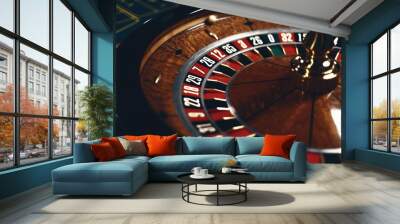 Roulette table in casino, with many games and slots, roulette wheel in the foreground. Golden and luxury light, casino interior. Gambling is the wagering of money or playing games of chance for money Wall mural