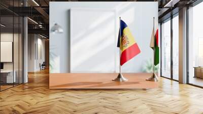 FLAGS OF ANDORRA AND MADAGASCAR  ON TABLE Wall mural