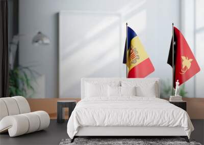 FLAGS OF ANDORRA AND PAPUA NEW GUINEAON TABLE Wall mural