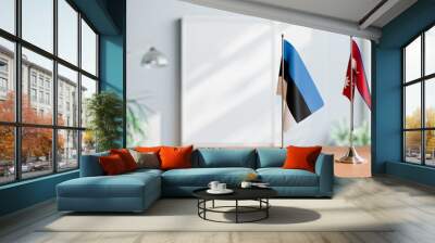 FLAGS OF ESTONIA AND NEPAL ON TABLE Wall mural