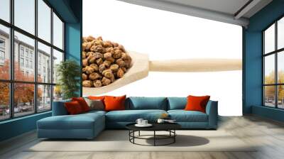 raw black chickpeas in wooden spoon isolated Wall mural