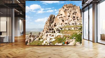 rock-cut Uchisar castle in Cappadocia in spring Wall mural