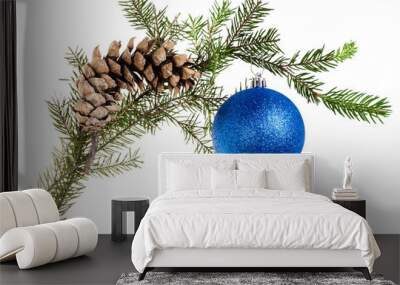 twig of fir tree with cone and blue ball on white Wall mural