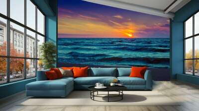 Beautiful pink sunset over sea Wall mural