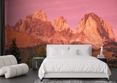 Mountain landscape in the evening. The Dolomites Alps against the sunset sky. Sella Pass, Grohmannspitze, Selva di Val Gardena, Bolzano, Italy Wall mural