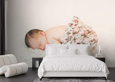 Pretty newborn sleeping baby isolated from background Wall mural