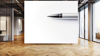 a ballpoint pen rests on a white background with ample copy space for text or design elements Wall mural