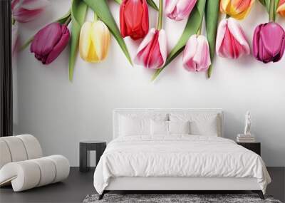 A flat lay banner featuring a beautiful bouquet of tulips on a white background capturing the essence of International Women s Day and the arrival of spring Ample copy space is provided for customizat Wall mural