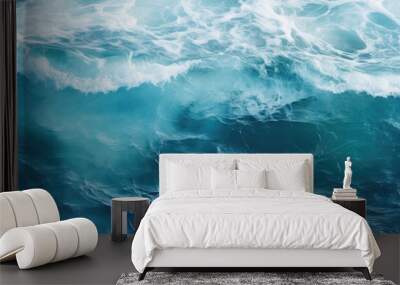 A top down view of ocean waves creating water patterns suitable as a background image with copy space Wall mural