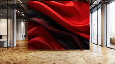 A top view of a copy space image showcasing a vibrant combination of red and black silk fabric Wall mural