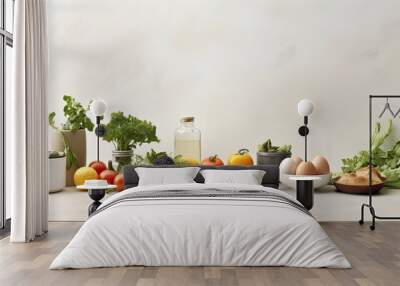 Arranged fruits vegetables and eggs on white table in kitchen healthy vegetarian food background and banner Wall mural