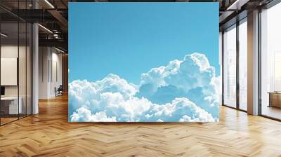 Background of clear blue sky with fluffy white clouds ideal for copy space image Wall mural