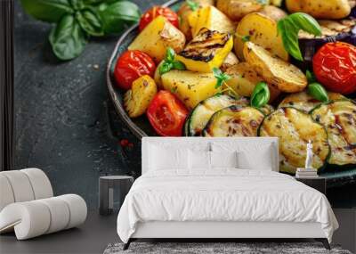 Baked vegetables: potato, zucchini, eggplant on plate. Vegetarian food. Copy space image. Place for adding text or design Wall mural