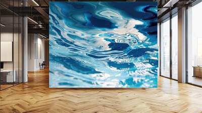 Blurry image of an abstract water pattern with reflections of fish blue sky and a building. with copy space image. Place for adding text or design Wall mural