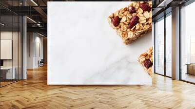 Delicious homemade granola bars on a white marble table top view Banner layout with room for text. with copy space image. Place for adding text or design Wall mural