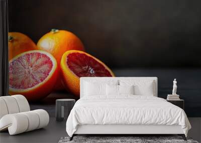 Fresh juicy blood oranges on a dark background. with copy space image. Place for adding text or design Wall mural