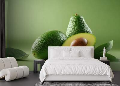 Fresh organic ripe green whole and sliced Fuerte avocado with leaves copyspace close up isolated on a white background Wall mural