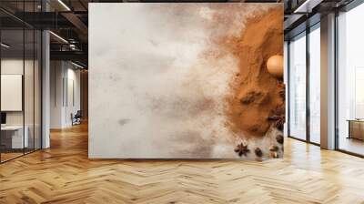 Ingredients for a spiced cake with eggs laid out on a table Wall mural