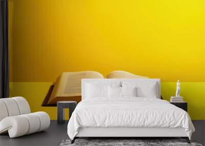 Religious concept Holy Bible on yellow table Wall mural