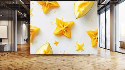 Top view of star fruits on a white background with yellow watercolor. with copy space image. Place for adding text or design Wall mural