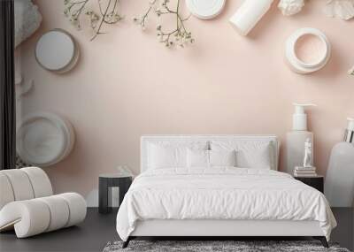 Various white beauty products for face hands legs and body on a light pink surface designed for women Features an open space for text or logo in the composition of the flat lay copy space image Wall mural