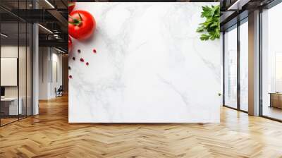 White cooking background featuring essential Italian Mediterranean ingredients tomatoes parsley olive oil salt pepper garlic flat lay on a white table top view copyspace Wall mural