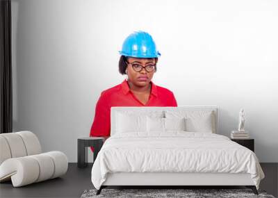 beautiful female engineer thinking and holding clipboard. Wall mural