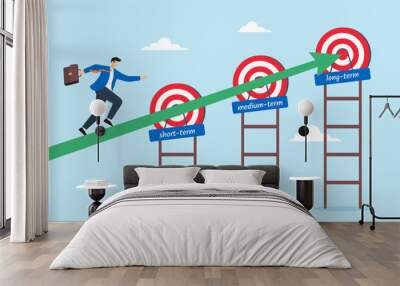 Businessman running towards short, medium, and long term goals, illustrating setting objectives across different timeframes. Concept of step to achieving success and aiming reaching targets Wall mural