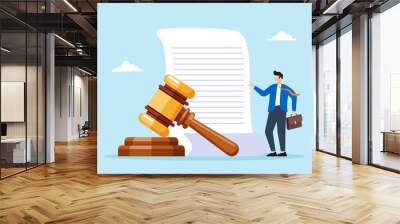 Mature lawyer stands with judge gavel and legal documents. Concept of professional attorney office, realm of law, and authorization of judicial decisions Wall mural