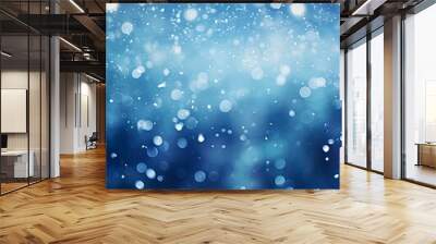 blue christmas background with frost and snowflakes and lots of out of focus bokeh with room for text. Wall mural