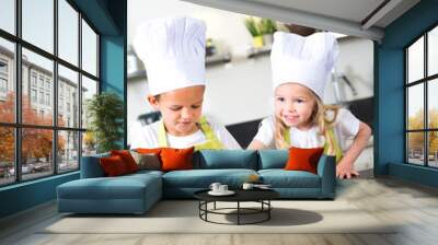 happy children kids family preparing funny cake kitchen at home Wall mural