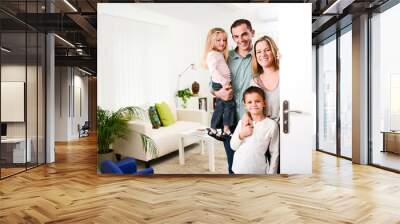 happy family with young kids welcoming a guests at home doorh Wall mural