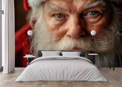 Close up shot of senior bearded man in santa clause. Wall mural