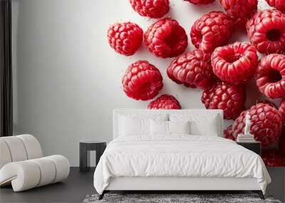 Raspberries fruit on white background with empty space Wall mural