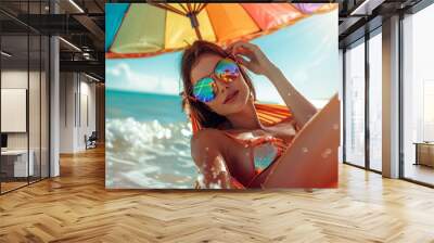 Escape to the beachside paradise with a woman wearing a bikini and yellow glasses, enjoying summer relaxation on a hammock by the sea Wall mural